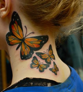 SirLexi Rex tattoo butterflies on neck