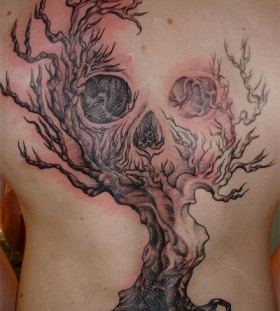 Skull and tree scary tattoo