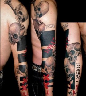 Skull on arm tattoo by Volko Merschky