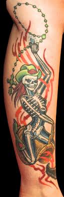 Skull tattoo by Michael Norris