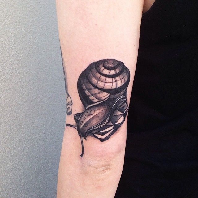 Snail tattoo by Pari Corbitt