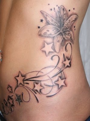 Stars and flowers hip tatoo