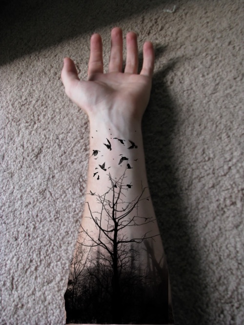 Tree and bird tattoo