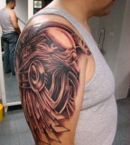 Tribal eagle tattoo
