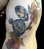 Watch tattoo by Michael Norris