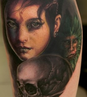 Woman and skull tattoo by Andy Engel