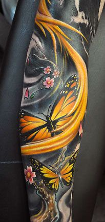 Yellow butterflies tattoo