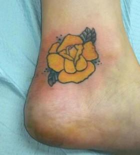 Yellow tattoo on feet
