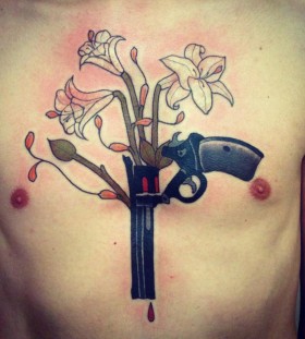 aivaras lee tattoo gun and white flowers