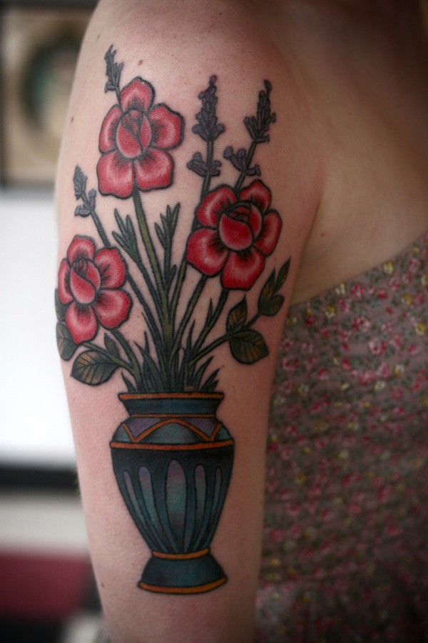 alice carrier tattoo vase of flowers on arm