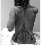 back tattoo design for women tribal piece