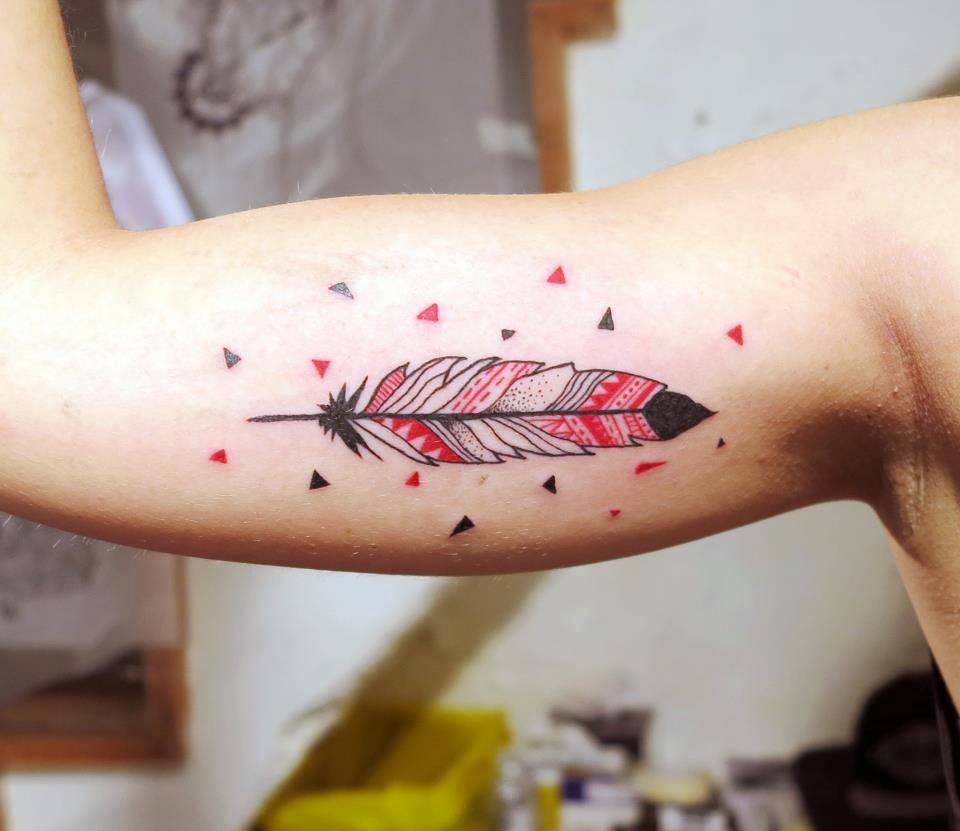black and red feather tattoo by matik