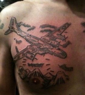 duke riley tattoo fighter plane dropping bombs