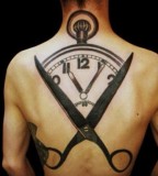 illusion of time tattoo blackwork on back by M-X-M