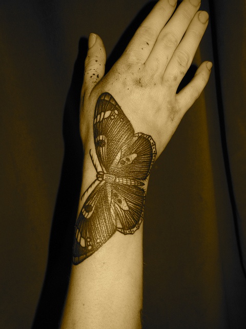 liam sparkes tattoo butterfly on arm and hand
