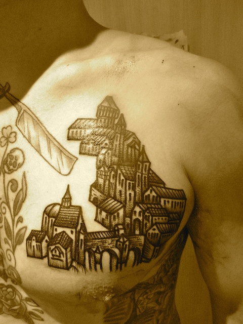 liam sparkes tattoo little village on chest