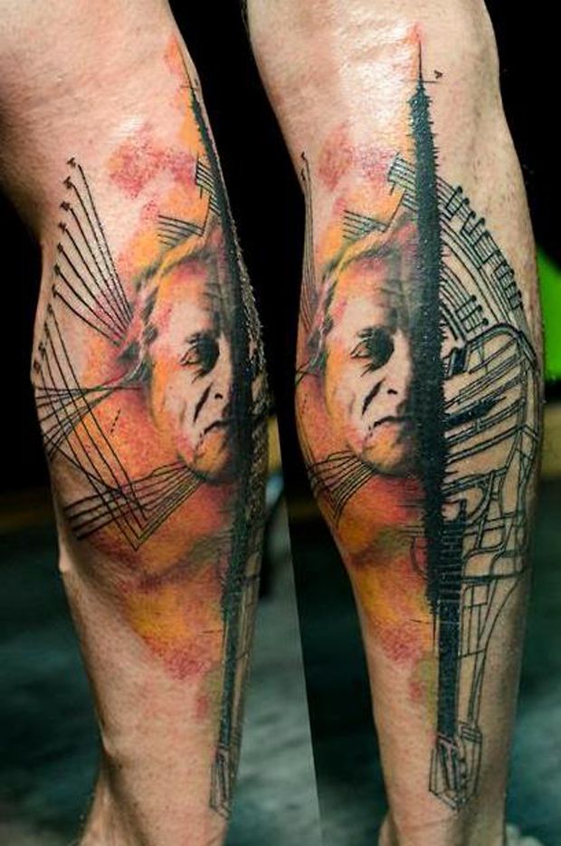 man’s face tattoo on leg by klaim