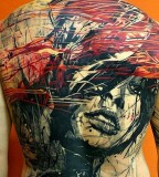 modern tattoo full back work with woman's face