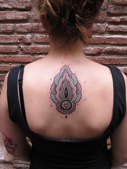 ornamental tattoo on back by matik