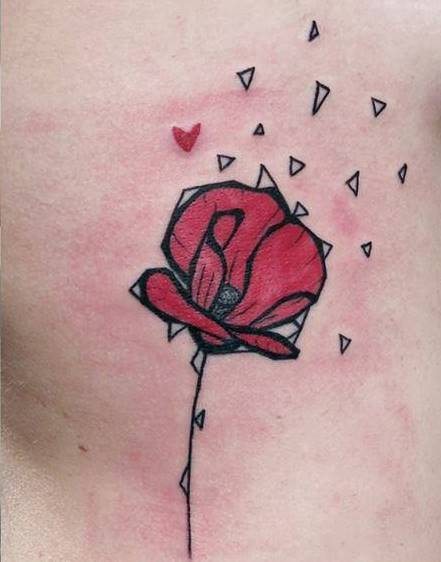poppy tattoo on ribs by matik