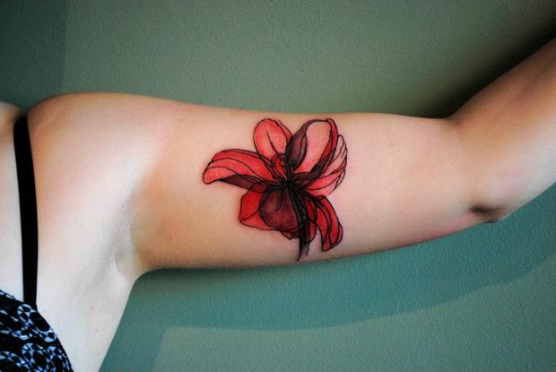red flower tattoo on arm by klaim