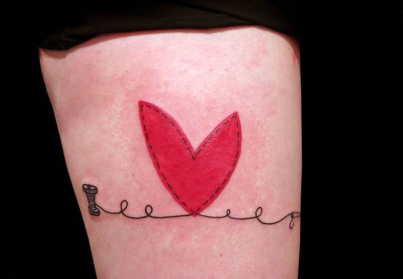 red heart and thread tattoo by matik