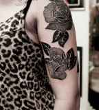 two black rose tattoos on arm by M-X-M