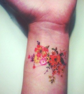 wrist tattoo floral work