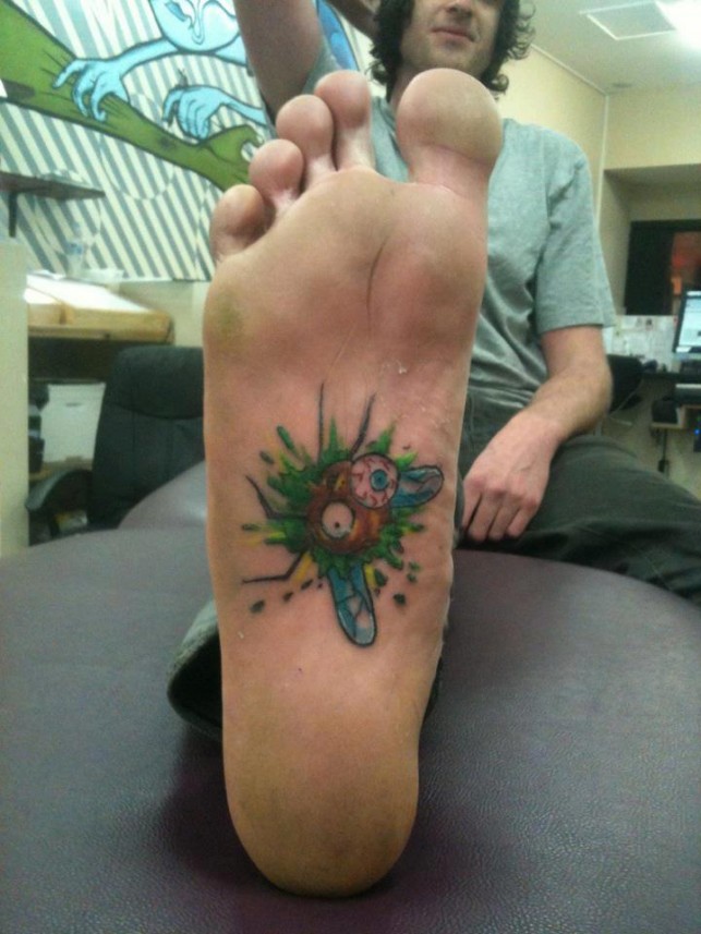 Awesome foot tattoo by Mel Wink
