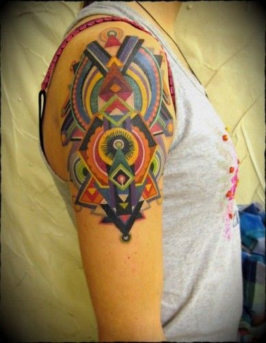 Awesome shoulder abstract character tattoos