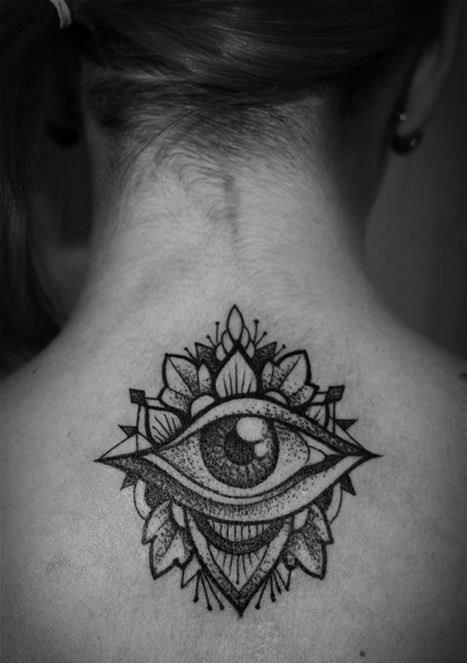 Back eye tattoo