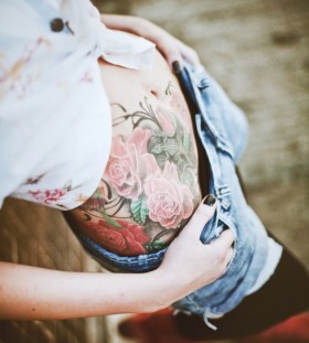 Beautiful roses hip tattoo