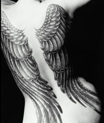 Black and white angel wings tattoo
