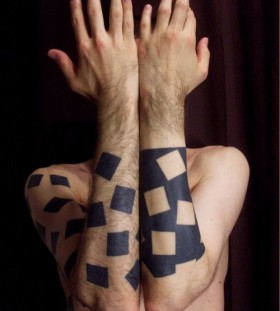 Black and white puzzle tattoo