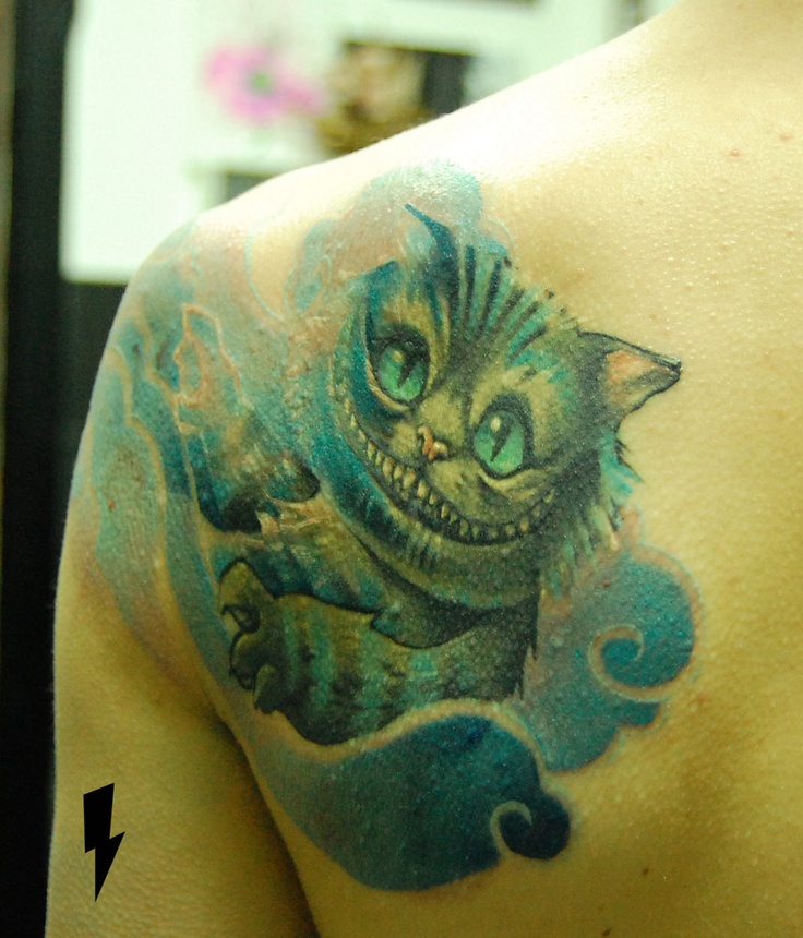 Cheshire cat tattoo by Jukan