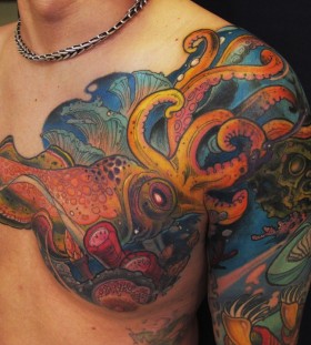 Chest and shoulder tattoo by Jee Sayalero