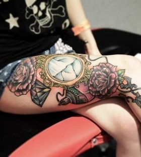 Colorful legs clock tattoo