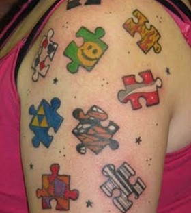 Colorful puzzle tattoo