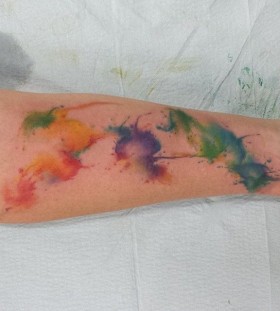Colorful tattoo by Mel Wink