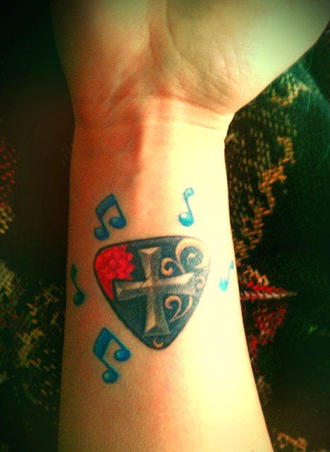 Criss  music tattoo