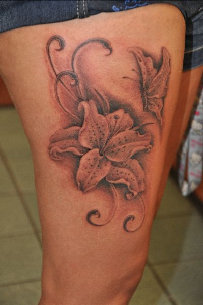 Cute flower tattoo by Corey Miller