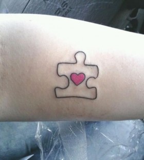 Cute puzzle tattoo