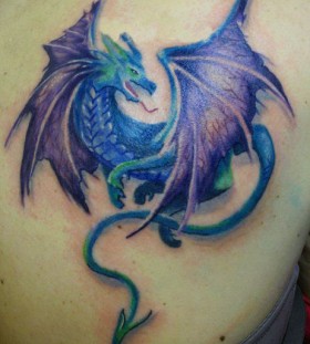 Dragon tattoo  green smiling dragon