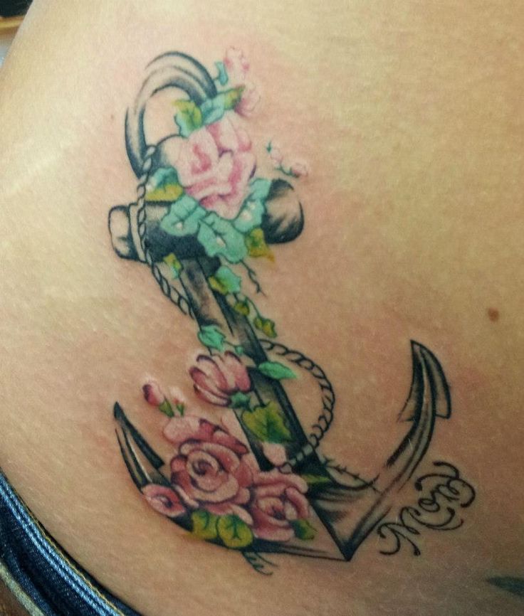 Flowers and anchor tattoo