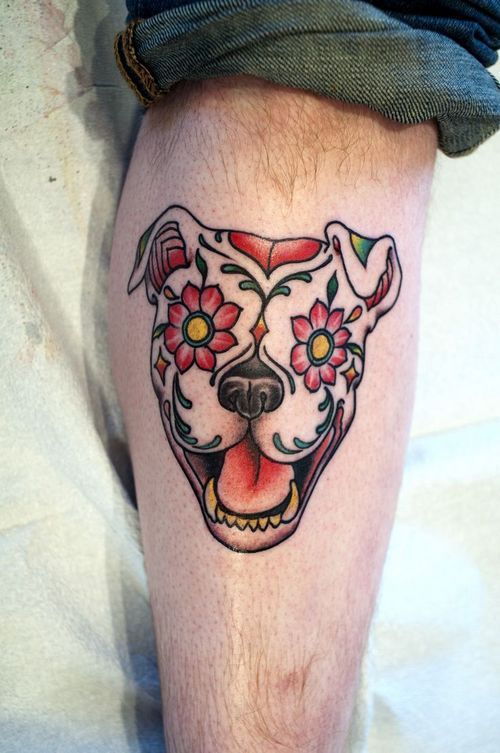 Flowers and dog tattoo