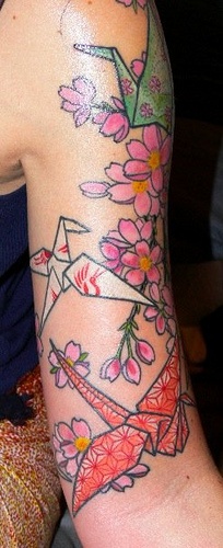 Flowers and origami tattoo