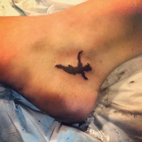 Foot Peter Pan tattoo