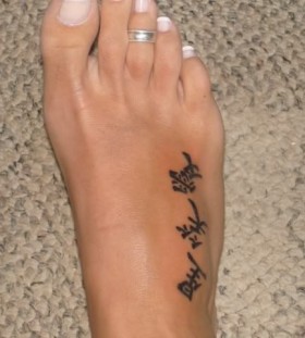 Foot chinese tattoo