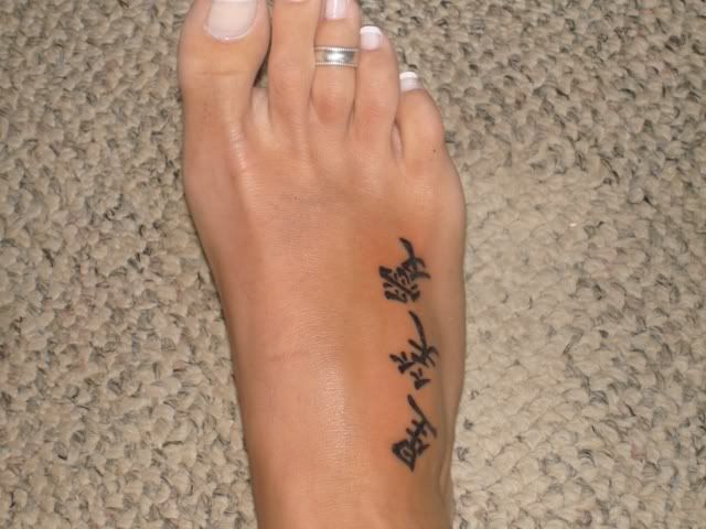 Foot chinese tattoo