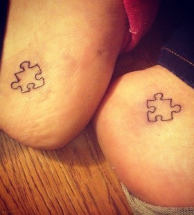 Foot puzzle tattoo